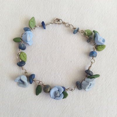 Pulsera plata 925, lapislázuli y flores celestes 