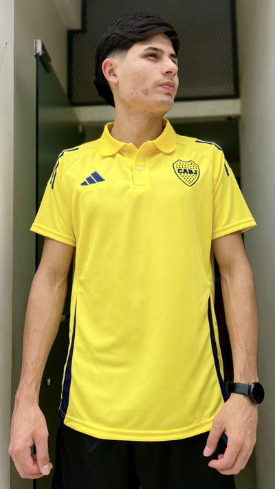 CHOMBA BOCA JRS AMARILLA  24/25