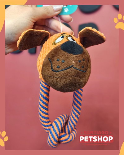 Perro de peluche con mordillo