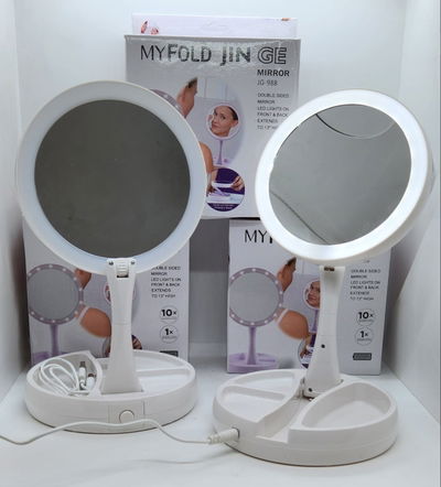 Espejo redondo con luz led.Plegable y con aumento