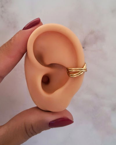 Earcuff Lazo Cruzado Ac. Dorado 