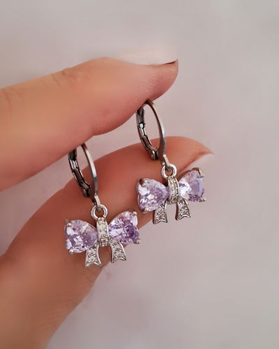 Argollas 1cm Moño Gem Lila Ac. Quirúrgico