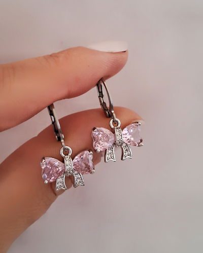 Argollas 1cm Moño Gem Rosa Ac. Quirúrgico 