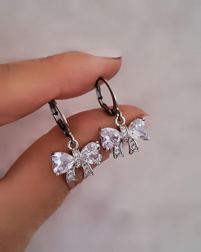 Argollas 1cm Moño Gem Cristal Ac. Quirúrgico