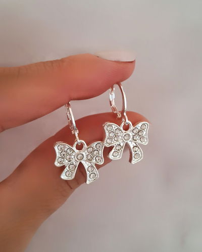 Argollas 10mm Moño Strass Ac. Blanco 