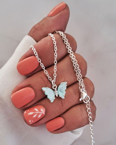Collar Mariposa Nácar Celeste 45-5cm Ac. Blanco 