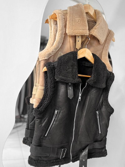 Chaleco eco cuero con cinto