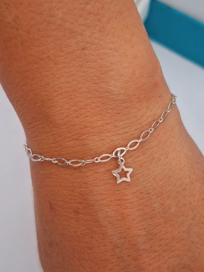 Pulsera de plata maciza con estrellas 
