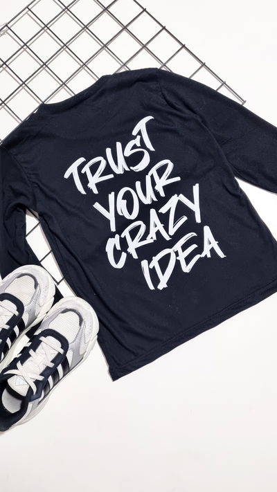 REMERA MANGAS LARGAS TRUST