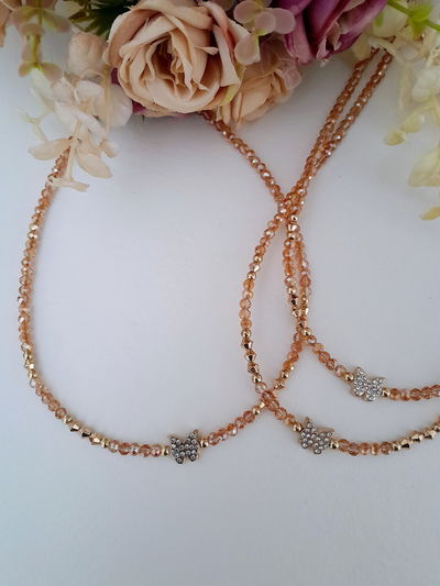 Collar mariposa dorada