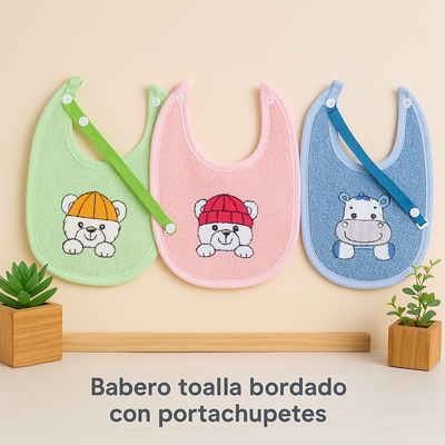 Babero de toalla bordado talles 1 y 2, forrado en plástico, con portachupete