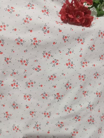 Algodón con lycra "Mini ramitos rojos"