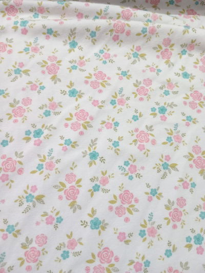 Algodón con lycra  "rositas rosa y celeste" (ver más)