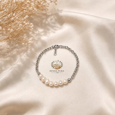 Pulsera de perla de río natural con cierre en acero quirúrgico 
