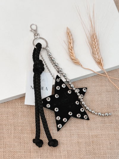 Llavero estrella negro