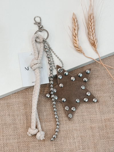 Llavero estrella beige