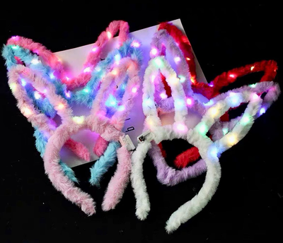 VINCHA CONEJA PELUCHE CON LUZ X 12 UNIDADES (VARIOS COLORES)