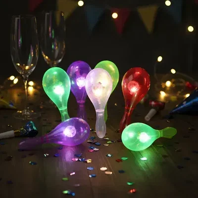 (12 UNIDADES) MARACAS LED LUZ MULTICOLOR 