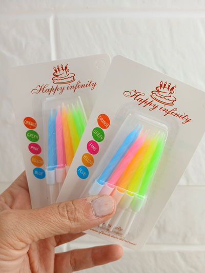 VELA TIRABUZON FLUO CON PORTA VELA BLISTER X 10U MULTICOLOR