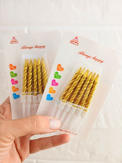 VELA TIRABUZON FLUO CON PORTA VELA BLISTER X 10U DORADO