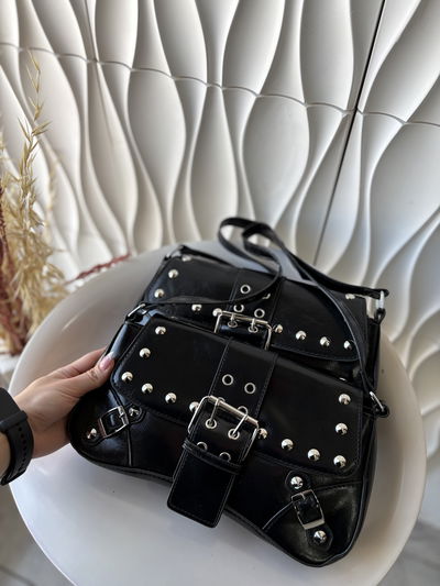 CARTERA TACHAS/ CHAROL