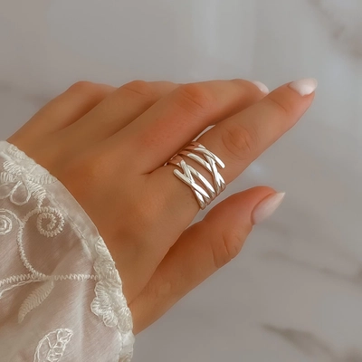 Anillo cobweb regulable