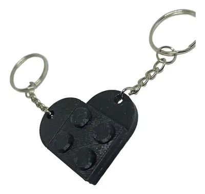 2 Llaveros - Lego - Juntos Forman Un Corazón - Negro