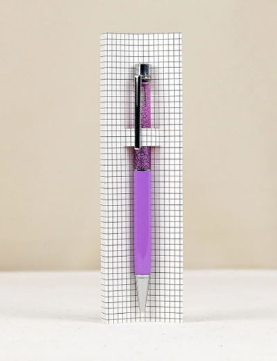 Lapicera violeta con glitter