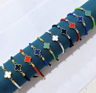 Nuevo Ingreso ! Pulsera hilo con trébol de acero