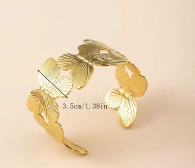 Pulsera abierta mariposa acero