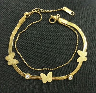 Pulsera de acero quirurgico con dijes de mariposas y stras