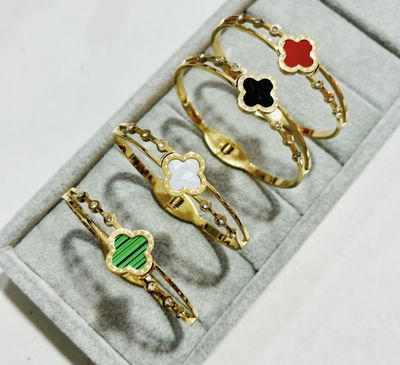 Pulsera esclava trébol acero dorado 