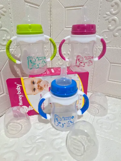  MAMADERA CON TAPA Y AGARRE + TETINA 180ML