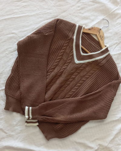 Swetter Universitario escote en V