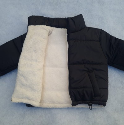 Puffer de mujer con corderito