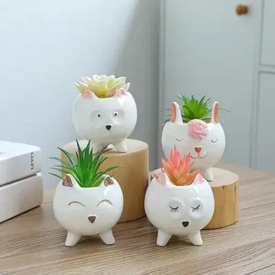 MACETA CERAMICA ANIMALITOS C/PLANTAS