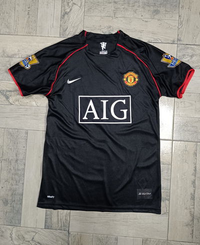 camiseta retro manchester united negro