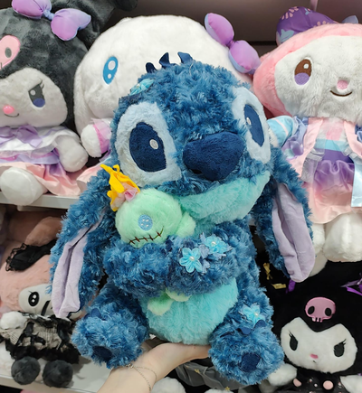 PELUCHE STITCH ABRAZO TRAPO FLORES AZULES 40CM