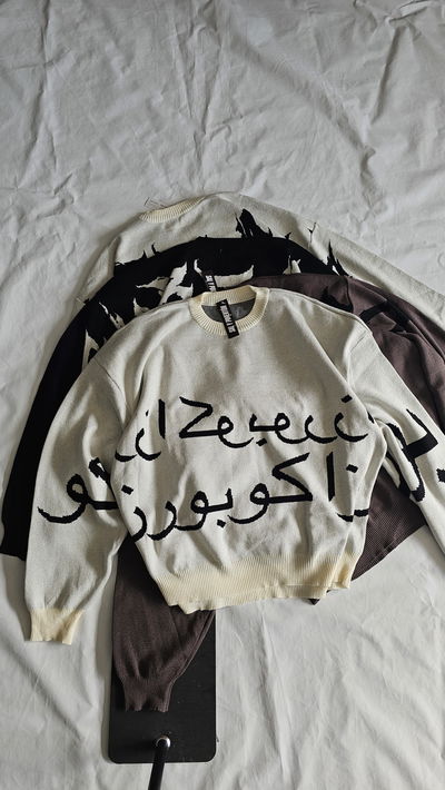 SUÉTER BOXY ARABE
