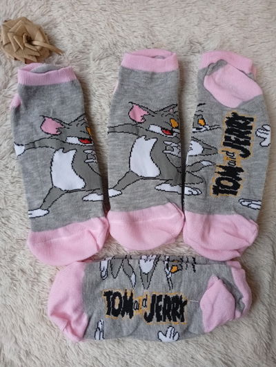 Soquetes TOM, Adulto