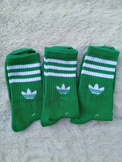 Adidas VERDE RAYA BLANCA. Adulto. LC