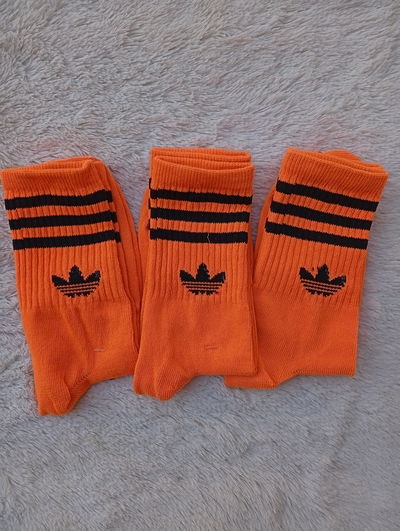 Adidas NARANJA RAYAS NEGRA. Adulto. LC