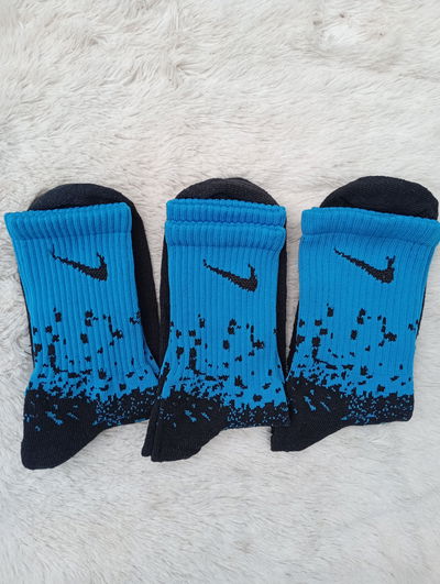 Tennis NIKE PINTITAS CELESTE NEGRO. Adulto. Algodon