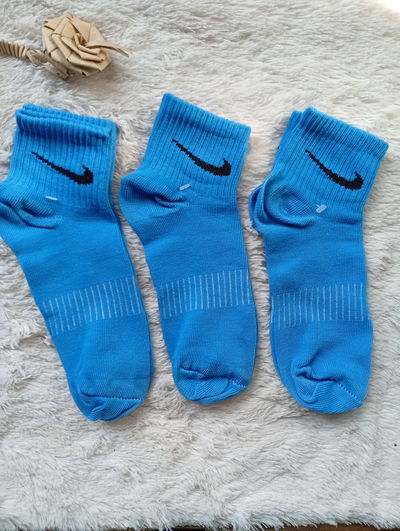 1/4 Nike CELESTE LISA. Adulto. LC