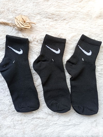 1/4 Nike negra. Adulto. LC