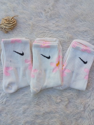 NIKE FLORES ROSA CLARITAS. Adulto. LC