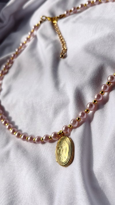 Collar relicario de perlas 