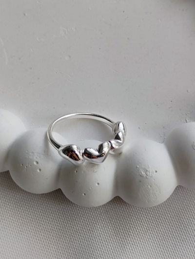 Anillo corazones acero blanco T 17