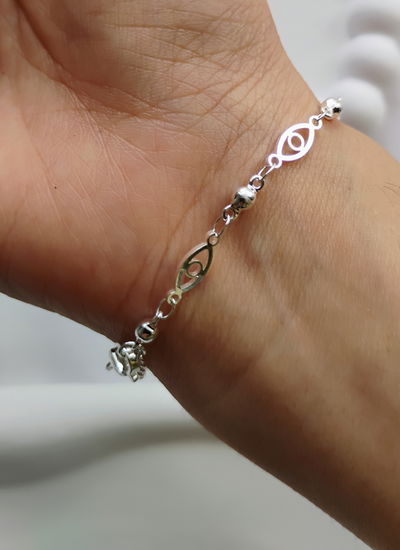 Pulsera ojitos acero blanco 