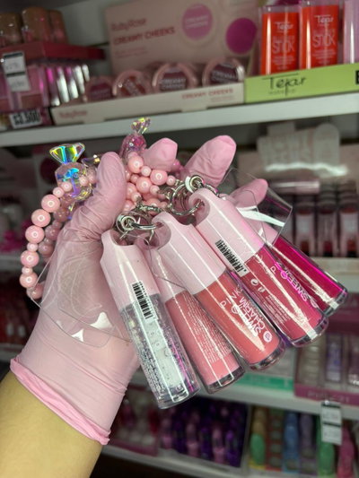CAJA X24 UNI BRILLO LABIAL + LLAVERO PORTA CELULAR SWEET PINK 21